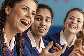 School girls discussing